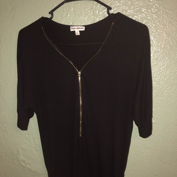Black stretch zip from shirt. - Picture 2 of 2